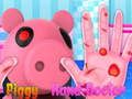 Žaidimas Piggy gydo jo rankas  internete